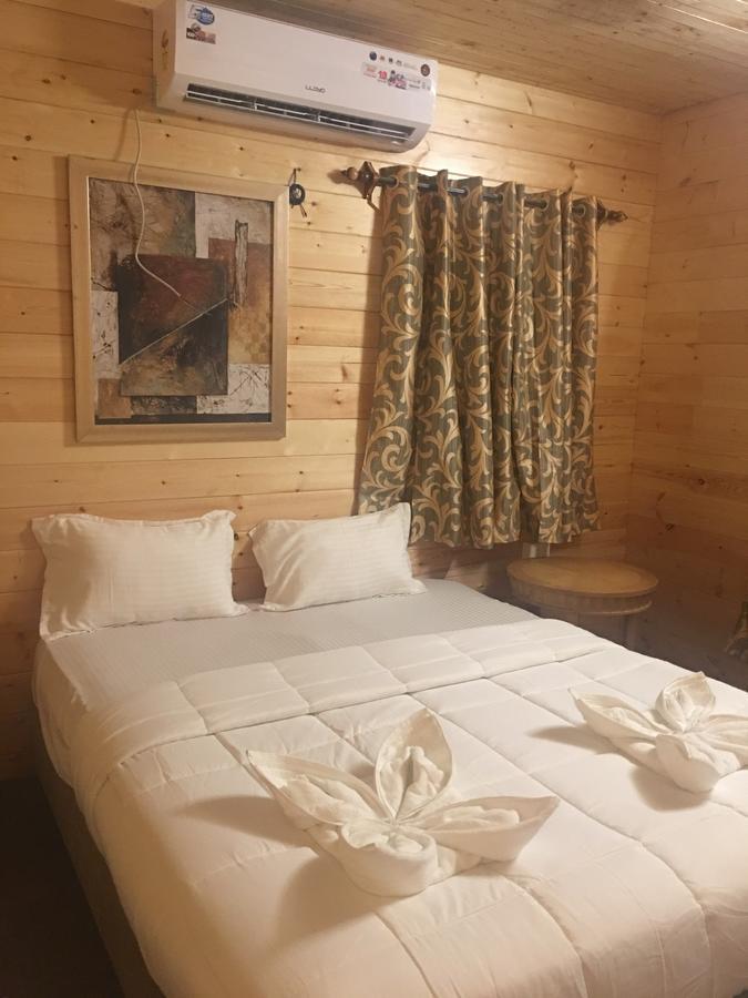 Tiara Fiesta Beach Cottages Morjim Exterior photo